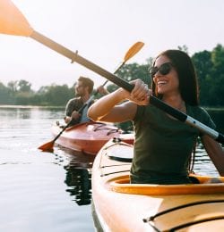 couple kayaking on lake