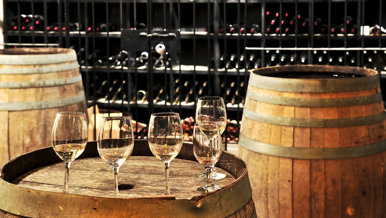 Wine glasses and barrels