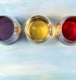 Three glasses of different kinds of wine